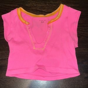 Urban Outfitters out from under gold for gold in Pink + Orange